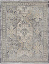 Close-up of Nourison Lynx Ivory Charcoal Vintage Indoor Area Rug featuring an ornate, distressed geometric pattern.