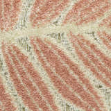 Close-up of the Nourison Aloha Sage Rose rug showing the pile texture and sage rose and cream geometric pattern.