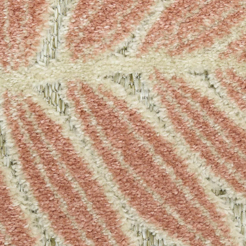 Close-up of the Nourison Aloha Sage Rose rug showing the pile texture and sage rose and cream geometric pattern.