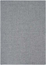 Close-up of the Nourison Tulum Denim Outdoor Area Rug, showing a woven texture in shades of blue and gray.