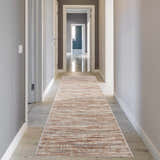 Hallway scene with a Nourison Elation Ivory Grey runner rug. Modern, neutral color palette.