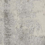 Close-up of the high-pile Nourison Elation Grey Ivory rug, showing its texture and modern abstract pattern.