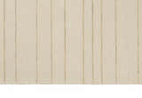 Close-up of the Calvin Klein Halo Ivory rug. Wool rug with subtle chestnut vertical stripes, handmade construction.