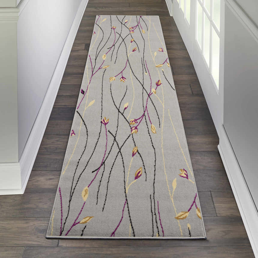 Hallway with Nourison Grafix Grey Contemporary Indoor Area Rug runner. Floral design in grey, purple, and gold.