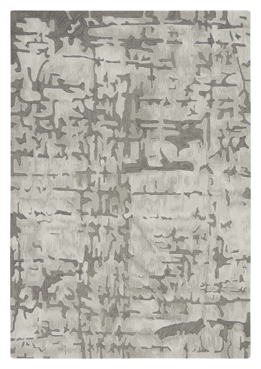 Close-up of the Nourison Symmetry Ivory/Taupe rug. Abstract, mid-century modern design with ivory and taupe hues. Handmade texture.