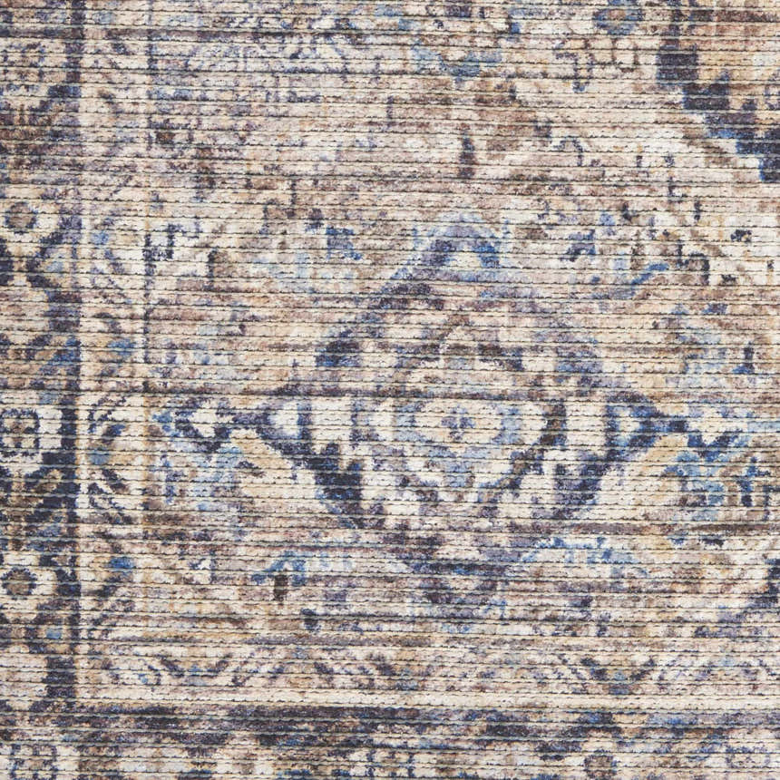 Close-up of Nourison New Concept Ivory Latte Vintage Rug, showing chestnut, ivory, and blue distressed pattern.