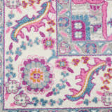 Close-up of Nourison Passion Light Grey Pink Bohemian Indoor Area Rug, showcasing floral and geometric patterns.