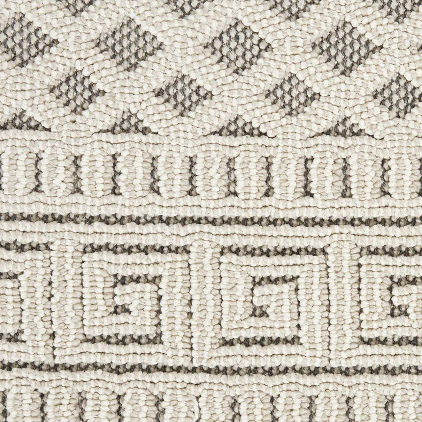 Close-up of Nourison Paxton Ivory/Grey Rug. Features geometric patterns, textured weave, and mid-century modern style.