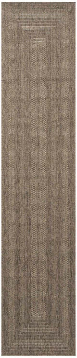 Close-up of the Nourison Tulum Brown Outdoor Area Rug, showing its textured pile and dark brown color.