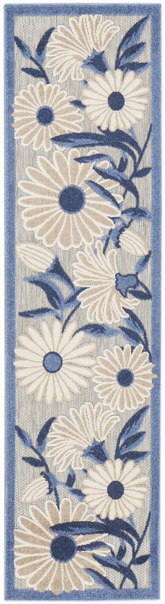 Close-up of Nourison Aloha Blue Grey Outdoor Area Rug featuring a floral daisy pattern with blue leaves.