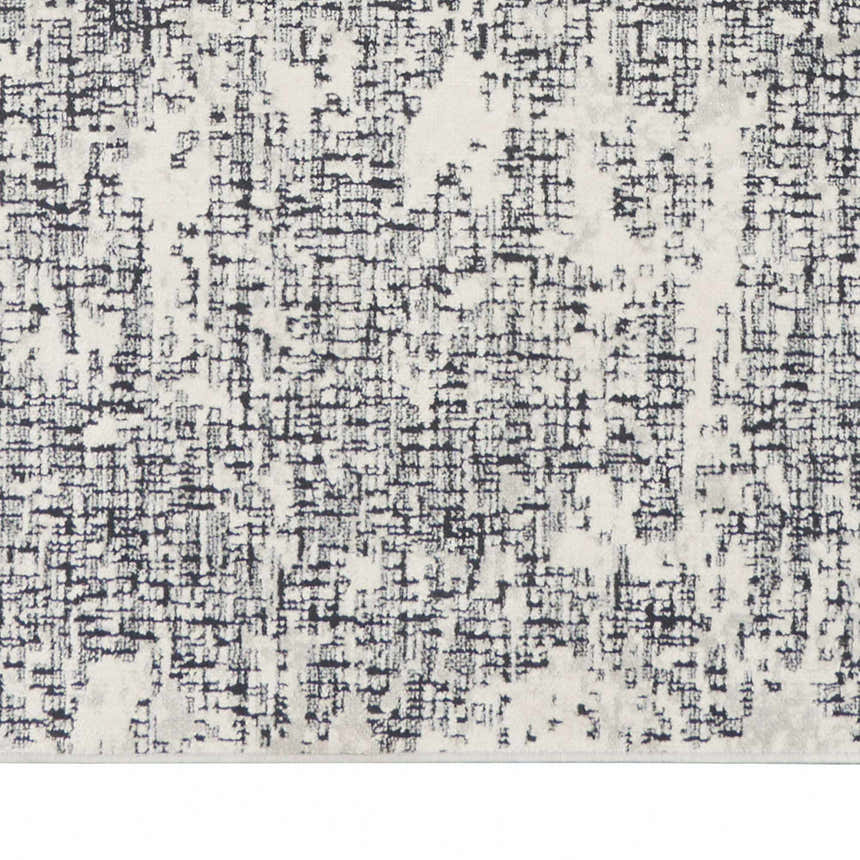 Close-up of Calvin Klein CK970 Vapor Ivory Black rug. Modern design with black grid pattern on an ivory background.