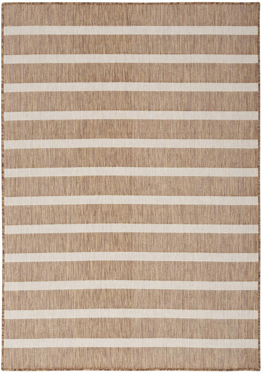 Close-up of Nourison Positano Jute Ivory rug, featuring a chestnut and ivory striped pattern and textured weave.