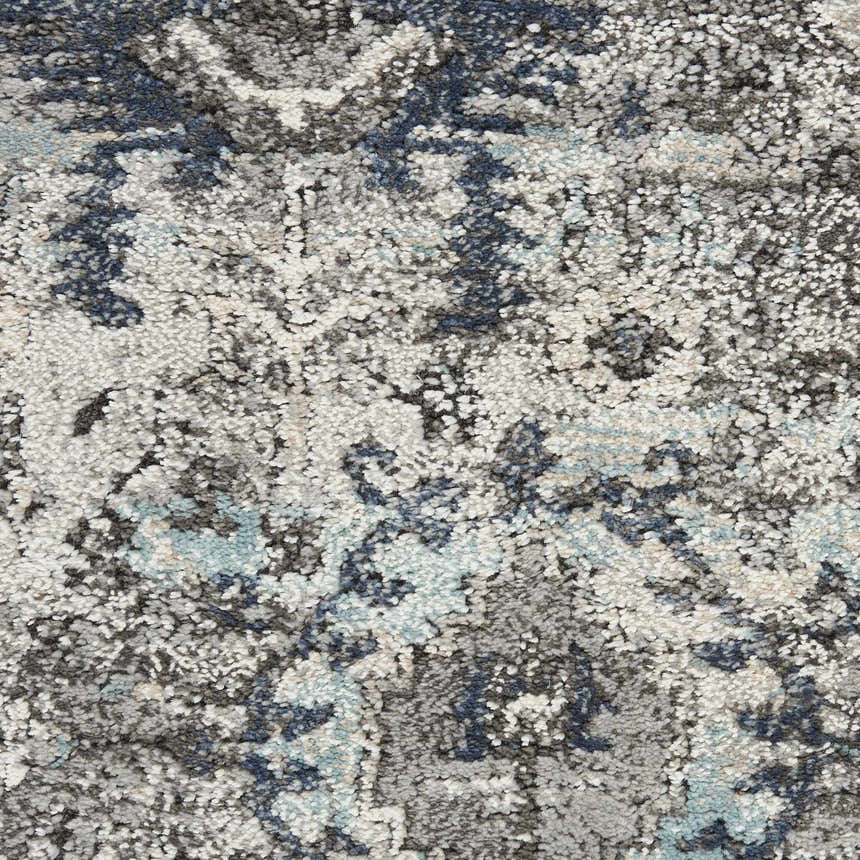 Close-up of the Nourison American Manor Grey Farmhouse Area Rug, showing texture and pattern detail in gray, blue, and white.