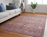 Living room with a Feizy Rawlins Red/Tan/Pink rug, white sofa, blue pillows, and wood floors. Roomscene-Rectangle