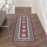 Hallway scene with a Nourison Fulton Red Vintage runner rug on herringbone wood floors.
