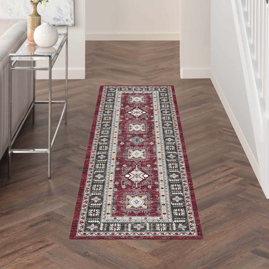 Hallway scene with a Nourison Fulton Red Vintage runner rug on herringbone wood floors.
