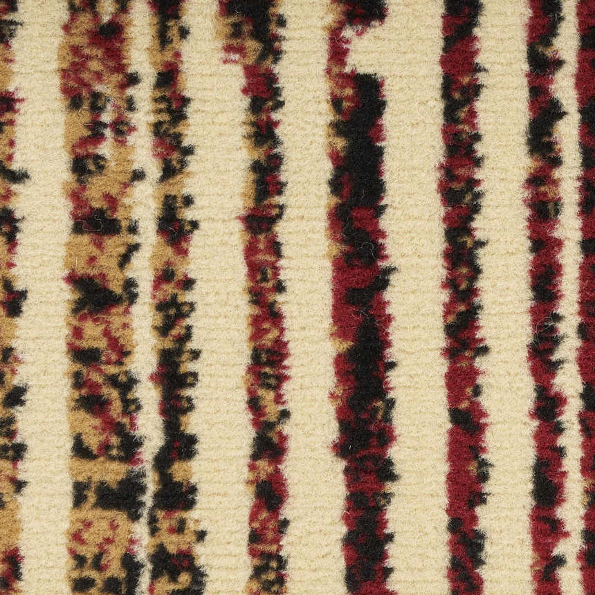 Close-up of the Nourison Grafix Brick Multicolor Rug. Features a striped pattern in brick red, tan, and black on a cream background.