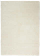 Close-up of the plush texture of the Nourison Malibu Shag Ivory Shag Indoor Area Rug.