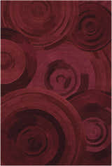 Close-up of the Nourison Palisades Plum area rug featuring a textured, dark purple concentric circle pattern.