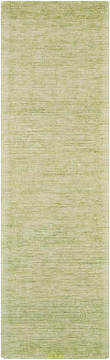Close-up of the Nourison Weston Citron Rug. Modern design with a subtle, textured pattern in shades of light green.