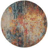 Round Nourison Celestial Multicolor rug featuring a modern abstract design in shades of blue, red, orange, and beige.
