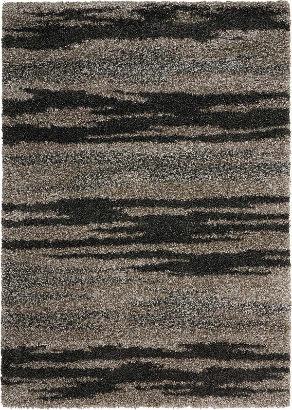 Close-up of the Nourison Amore Marble Shag rug showing its soft texture and horizontal marble pattern in gray and black tones.