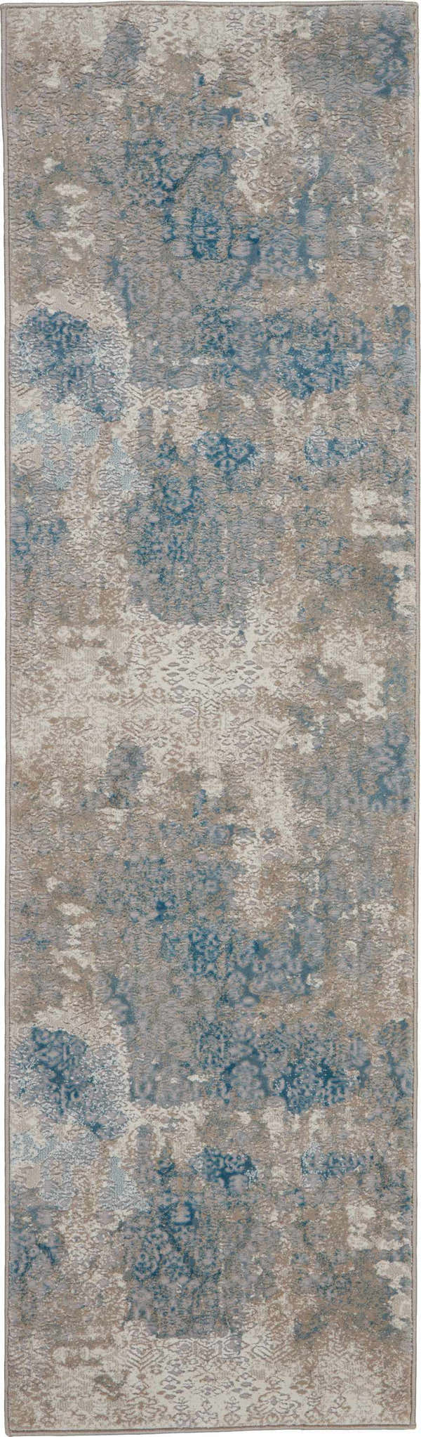 Close-up of Nourison Karma Ivory/Light Blue rug with vintage chestnut pattern and soft texture. Clearance.