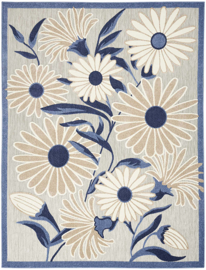 Close-up of the Nourison Aloha Blue Grey Outdoor Area Rug, featuring a daisy floral pattern with blue leaves on a gray background.