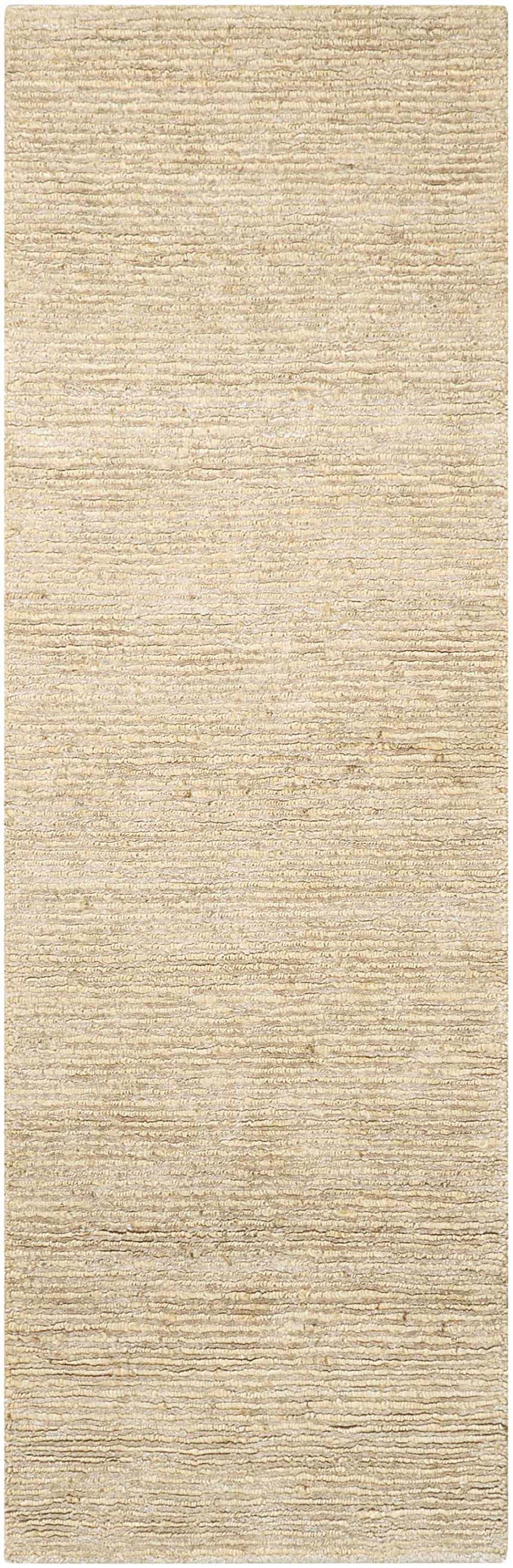 Close-up of the Calvin Klein Mesa Gypsum Rug. Handmade rug with a subtle horizontal textured pattern in neutral gypsum tones.