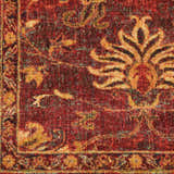 Close-up of the Nourison Jewel Brick Persian rug, showcasing its brick red, gold, and teal floral pattern and textured weave.