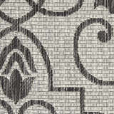 Close-up of the Nourison Country Side Ivory/Charcoal rug showing the farmhouse pattern and textured polypropylene weave.