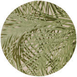 Close-up of a round Nourison Aloha Ivory Green Outdoor Area Rug with a leafy, tropical pattern.
