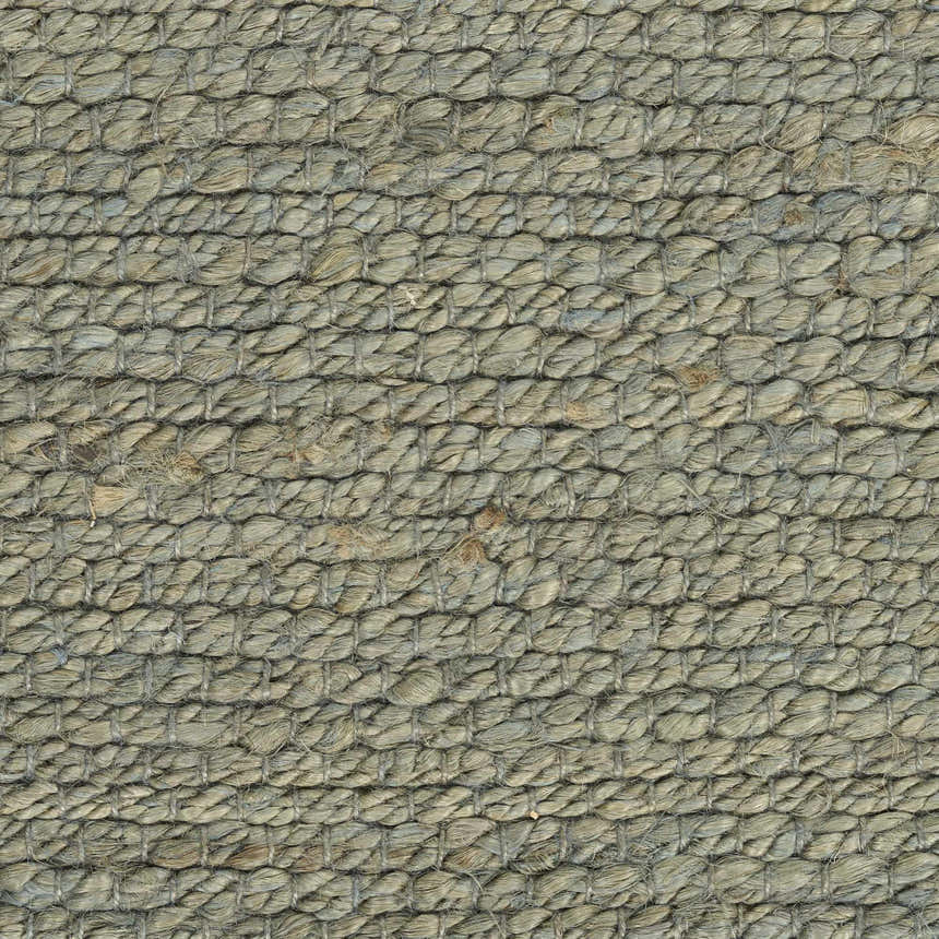 Close-up of the woven texture of the Nourison Natural Jute Sage Farmhouse Area Rug, showing muted sage and charcoal tones.