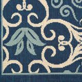 Close-up of Nourison Caribbean Navy Contemporary Area Rug pattern and texture. Navy, cream, and light blue floral design.