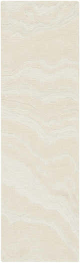 Close-up of the Nourison Graceful Ivory rug. Chestnut wool rug with a subtle, abstract wave pattern and textured handmade weave.