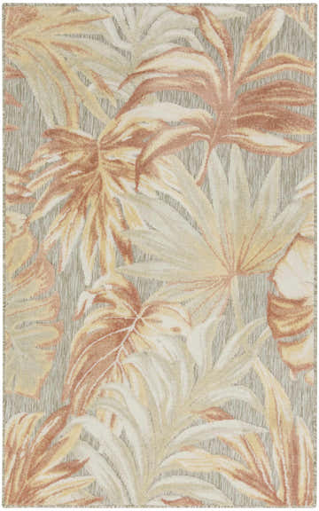 Close-up of Nourison Aloha Sage Rose rug featuring a large-scale tropical leaf pattern in sage, rose, tan, and cream.