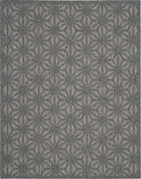 Close-up of the Nourison Cozumel Dark Grey rug. Features a geometric starburst pattern in shades of medium gray. Machine-made texture.
