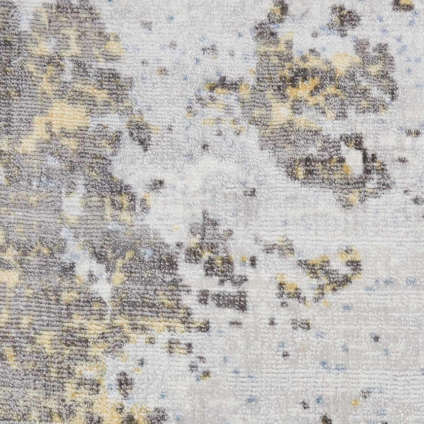 Close-up of the Nourison Safari Dreams Ivory Gold Painterly Area Rug, showing texture and abstract chestnut and gold design.