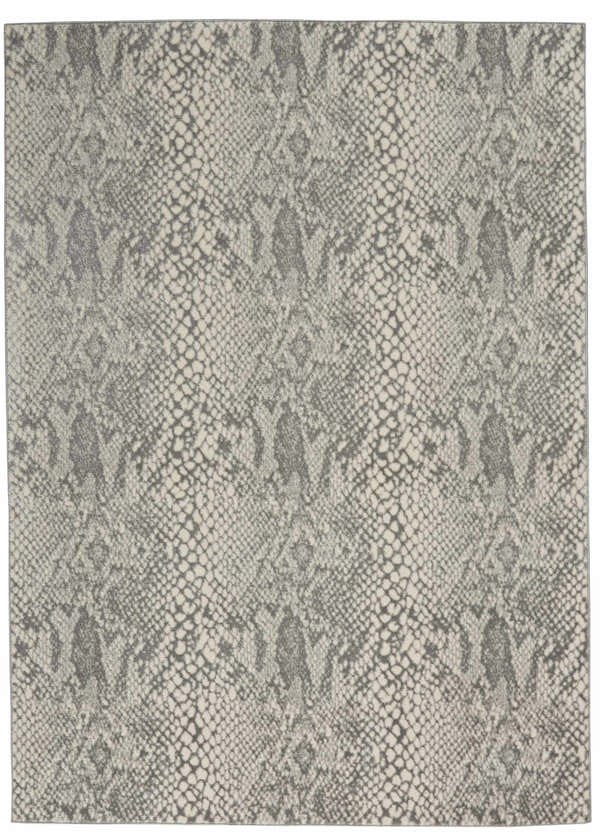 Close-up of the Nourison Solace Ivory/Grey rug, showcasing its modern, high-pile texture and reptile-inspired pattern.