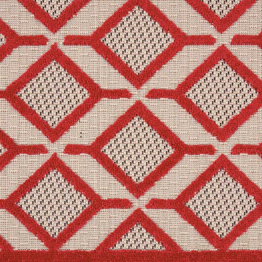 Close-up of the Nourison Aloha Red Casual Area Rug, featuring a geometric diamond pattern.
