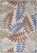 Close-up of Nourison Aloha Blue Mocha Outdoor Area Rug with a leaf pattern in blue, mocha, and beige.