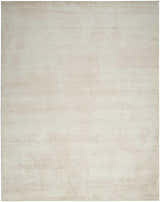 Close-up of the Nourison Serenity Home Ivory rug, showing its high pile texture and subtle chestnut color variations.