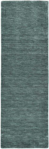 Close-up of the Feizy Luna Modern Solid Area Rug in green and white, showing its hand-woven texture. Design-Runner