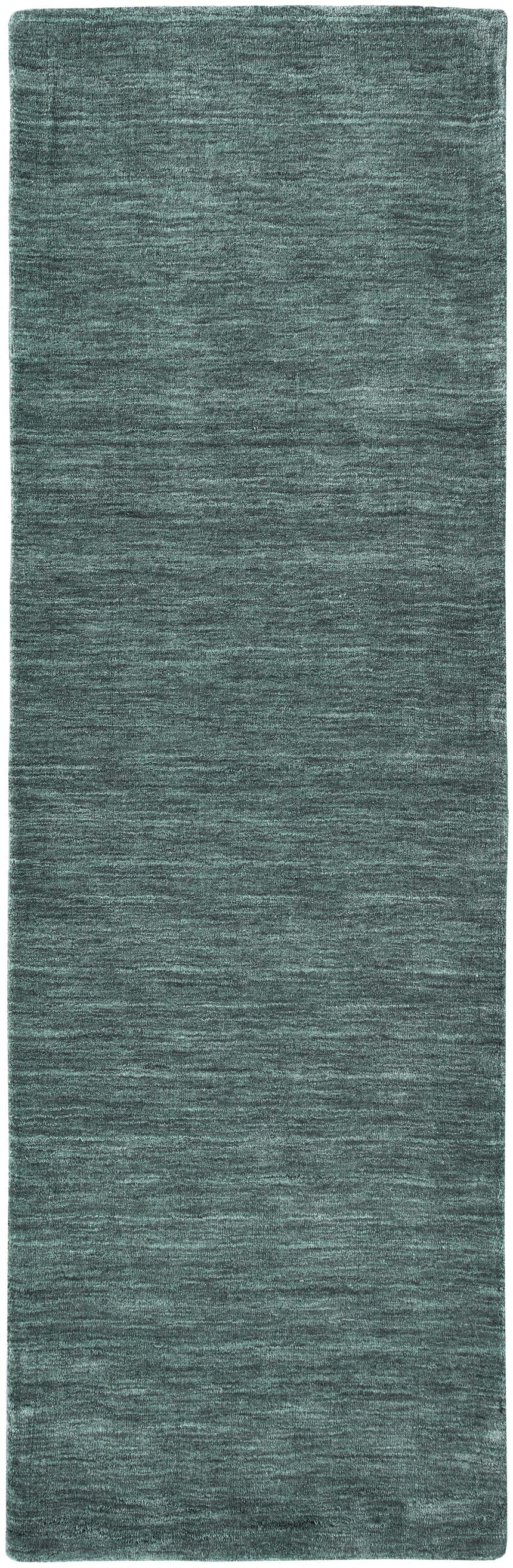 Close-up of the Feizy Luna Modern Solid Area Rug in green and white, showing its hand-woven texture. Design-Runner