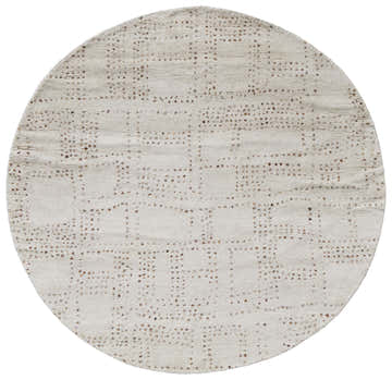 Close-up of a round Feizy Truxel Modern Polka Dots rug in tan and brown wool, featuring a casual, contemporary design. Design-Round