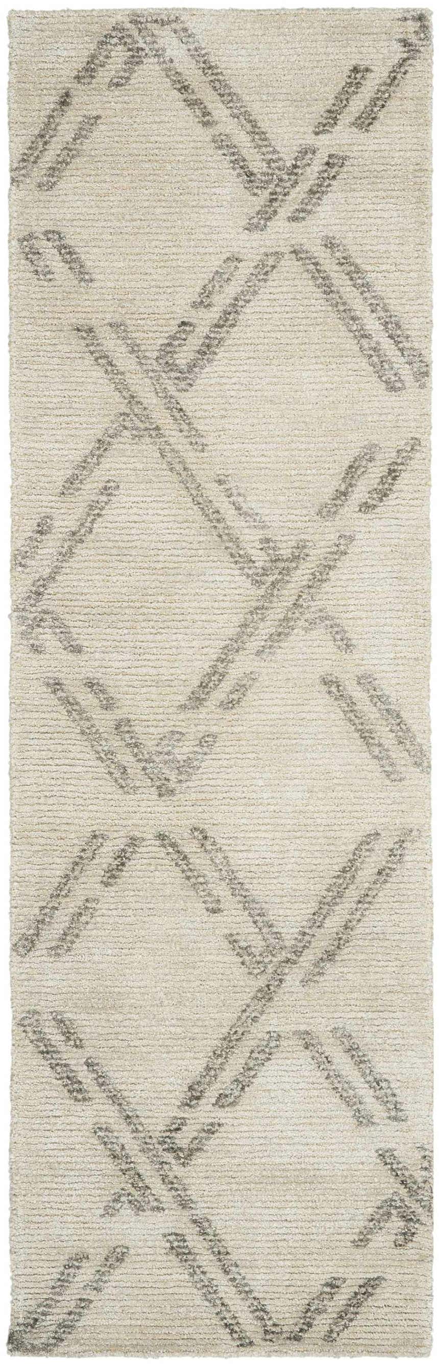 Close-up of Nourison Venosa Ivory/Grey rug. Mid-century modern design with a geometric pattern and jute/rayon texture.