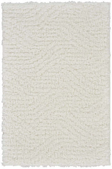 Close-up of the Calvin Klein Surfaces Ivory Shag rug showing its plush texture and subtle chestnut color variations.
