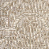 Close-up of the woven texture of the Nourison Aruba Beige Cream Area Rug. Neutral tones, subtle pattern.