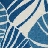 Close-up of the Waverly Sun N' Shade Blue Tropical Area Rug, featuring a light blue tropical leaf pattern on a white background.