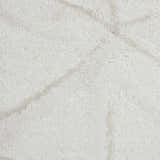 Close up of the light blue Nourison Key Largo rug, showing texture and contemporary pattern.
